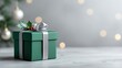 © nifty - Elegant green Christmas gift box with silver ribbon and festive holly berries for joyful holiday season celebrations and warm wishes this year