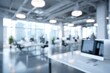 © Ifti Digital - Modern office space designed for technology workers showcasing a blurred backdrop of workstations and a bright, airy atmosphere
