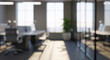 © GrapikHill - Blurred modern office interior with desks chairs and large windows with natural light