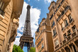 © Cavan Images - Paris France Eiffel Tower seen through historic city buildings
