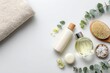 © Olena - Elegant Arrangement of Body Care Essentials on a Clean White Surface for Beauty and Bathing Inspiration
