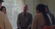 © Marco - Man speaks emotionally during group therapy session, surrounded by peers in quiet circle as he opens up in moment of vulnerability and connection