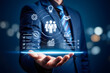 © RifatRahman - Businessman holding virtual interface with human resources, CRM, and management icons.