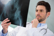 © auremar - man looking at xray results