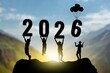 © BillionPhotos.com - People holding New Year 2026 concept.