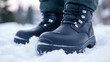 © Photography09 - Black Leather Work Boots in Snow, Winter wear, Footwear