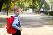 © Pixel-Shot - Cute little boy with backpack outdoors