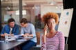© peopleimages.com - Phone call, meeting and discussion with business woman in office for planning, project update or budget contact. Networking, feedback and proposal negotiation with employee in agency for conversation
