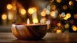 © hao - Warm candle glow in wooden bowl against a blurred festive background with lights, creating a cozy and inviting atmosphere for winter celebrations. High quality