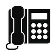 © Pixel Loft - Black silhouette of a modern desk telephone with handset and keypad