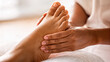 © Siadro Anastasiia - Massage therapy. Foot massage at the spa center close-up. Wellness procedures