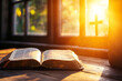 © Frank Parker - Morning sunlight shines on an open Bible by the window