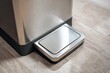 © Firmantio - Close-up of stainless steel trash can base plate