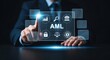 © Iqbal - Businessman touches virtual screen with AML (Anti-Money Laundering) icon and compliance system dashboard