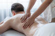 © InfiniteFlow - Caucasian man customer enjoying relaxing anti-stress spa massage and pampering with beauty skin recreation leisure in day light ambient salon spa at luxury resort or hotel. Quiescent