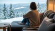 © Mas2ters - A woman gazes at a snowy landscape from a cozy couch in a warm room on a cold winter day outside