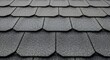 © MDKAWSAR - Close up of a textured gray roof with overlapping shingles
