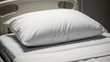 © Fatima - Hospital bed pillow in clean medical environment with soft lighting, white colors, healthcare comfort