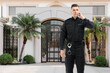 © New Africa - Security guard in uniform near house outdoors. Private property protection