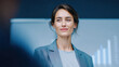 © NeutralStudio - Confident leader in modern office leads work and business team meeting with focus on strategy and growth as colleagues listen and share ideas with calm energy and clear vision