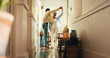 © peopleimages.com - Happy, couple and dancing with love at house for romance, affection and bonding together with rhythm. People, holding hands or twirl movement for weekend fun, romantic partner and marriage commitment