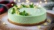 © Tatiana - Green cheesecake with mint leaf and white chocolate curl on wooden board with sugar. Festive dessert for Christmas and New Year.