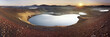 © Travel 'n' Lifestyle - View of a serene lake nestled within a volcanic crater, its still waters reflecting the soft glow of the setting sun, Veidivotn, Rangárþing ytra, Iceland.