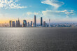 © ABCDstock - Empty asphalt road and city skyline with modern buildings scenery at sunrise in Guangzhou