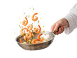 © Aurora Aesthetics - Chef hand sauteing shrimps garlic frying pan isolated white background png transparent cutout seafood cooking prawn delicious meal gourmet restaurant culinary motion tossing appetizer food studio shot
