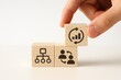© ParinApril - Hand placing wooden block with data growth icon into position among organizational symbols. Concept of teamwork, strategy, and performance improvement in business contexts.