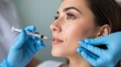 © Alex Pios - Doctor wearing gloves injecting filler into woman's cheek using syringe for cosmetic treatment to improve skin condition, reduce wrinkles, and enhance facial features