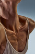 © master1305 - Ballet neckline and collarbone tension in dramatic light. Concept of perfume elegance, skincare campaigns, fashion editorial mood, emotional movement studies.