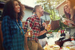 © peopleimages.com - Man, laugh and beer at party in backyard, friends and bonding for reunion, memory and weekend. People, group and happy outdoor for drinks, alcohol or bottle at social gathering on holiday in summer