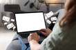 © New Africa - Woman sending or receiving email on laptop at home, closeup. Letters flying out of screen