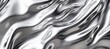© Ilja - Elegant Silver Metal Sheet Unfurling with Abstract Chrome Reflection for Modern Design Backgrounds