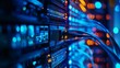 © Harry - Modern data center with vibrant blue lights and connecting cables for high speed internet connectivity and powerful networking solutions worldwide