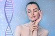 © New Africa - Beauty and science. Attractive woman against grey background with DNA