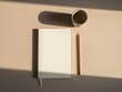 © Dialova Creative - Minimalist flat lay of a blank notebook and pencil for journaling or creative writing in warm sunlight