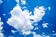 © Wittke Photography - Photograph of white cumulus clouds drifting across a bright and vibrant blue sky in the Blue Mountains in NSW, Australia.