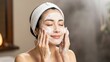 © Imon - Asian Woman Washing Her Face with Facial Cleanser and Eyes Closed in Bright Room Concept for Skincare Routine and Hygiene Exactly 200 Characters Stock Photo