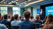 © mangolovemom - Conference audience watching presenter: capturing a moment of intense focus and knowledge-sharing at a business conference, with the presenter as the central point