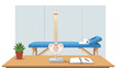 © Elizabeth - Professional chiropractic office setting featuring a detailed spine model ready for patient consultation and treatment planning