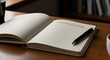 © soman - Open notebook with pen on desk and first sentence written