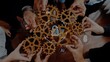 © InfiniteFlow - Hands gather around interconnected gears, symbolizing teamwork and innovation. Digital icons represent security and technology, highlighting collaboration in a modern workspace. Raster