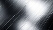 © k - close-up of brushed metal surface with reflective light and fine linear texture creating a sleek modern industrial appearance