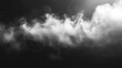 © Donna - White smoke swirling and drifting over a dark background creating soft abstract patterns and textures
