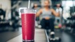 © Octopus16 - Redberry Smoothie in Clear Plastic Cup with Straw at Gym