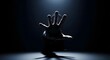 © Aditiya - Reaching hand emerges from darkness, dramatic lighting concept for overcoming challenges, seeking help, or suspenseful moments, creating a powerful visual metaphor