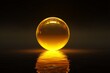 © Pacharee - A glowing golden sphere resting on water.