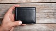 © Jannik - Hands holding an open empty wallet